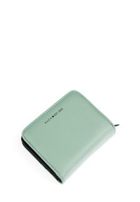 Mint green leather wallet with a smooth texture, rounded corners, and a zipper. Features embossed branding: "VUCH EST. 2015."