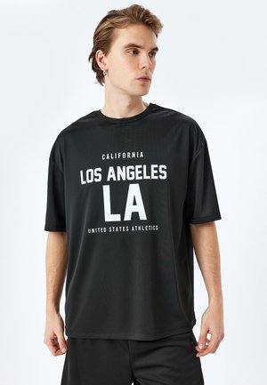 T-shirt con stampa - black
