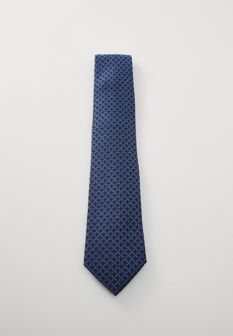 Gravata azul-marinho com um padrão geométrico em azul mais claro. Feita de tecido suave com a ponta afilada. Mede aproximadamente 147 centímetros de comprimento.