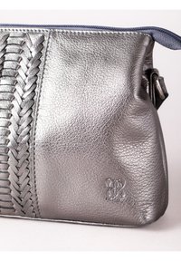 Metallic silver leather bag with braided design, smooth texture, and top zip closure. Features a small embossed logo on the side.