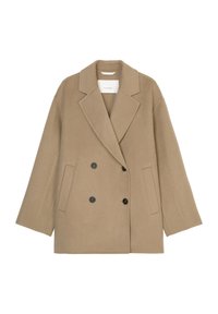 Beige oversized dubbelgeknopt jasje gemaakt van zacht textiel, met brede revers, twee knopen en zijzakken.