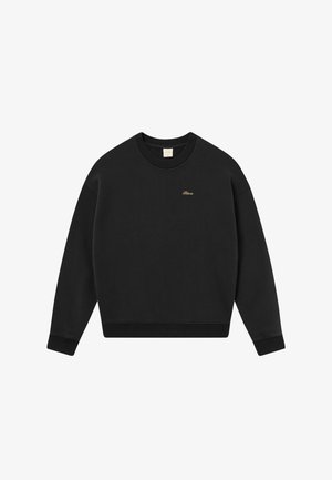 Black sweatshirt with a round neck and long sleeves. Features textured fabric and a small gold logo on the chest. Ribbed cuffs and hem.