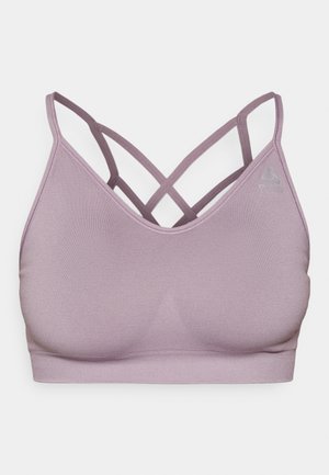 Világos lila sportmellény sima textúrával. Ujjatlan kialakítás jellemzi, hátul keresztbe futó pántokkal. Diszkrét logó részlet az oldalon.
