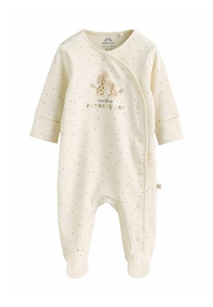 Krémové detské body s malými čiernymi bodkami, vyšívanými žirafami a textom „náš prvý Deň otcov“, s patentkami na prednej strane.