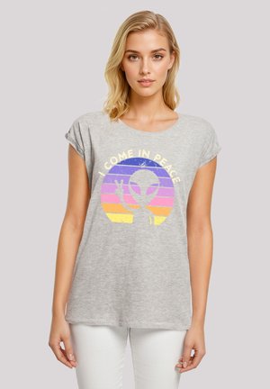 Graues Baumwoll-T-Shirt mit Rundhalsausschnitt und aufgerollten Ärmeln, mit einem grafischen Design eines Aliens und dem Text "ICH KOMME IM FRIEDEN."