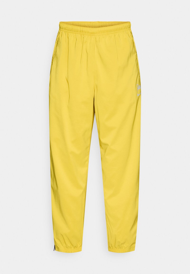 Nike Sportswear Trainingsbroek geel