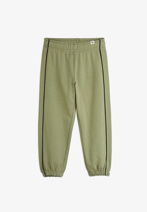 Grønne sweatpants med en blød tekstur, elastisk talje og sorte sidestiber. Snævre ben med elastiske manchetter ved anklerne. Størrelse: M.
