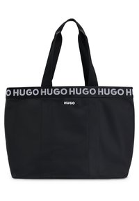 Borsa a tracolla nera realizzata in tessuto resistente, con una larga banda logo nella parte superiore e due manici robusti per un facile trasporto.
