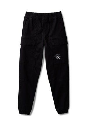 Mustad cargo-püksid elastse vöökoha ja värvlitega, suured küljetaskud ning valge Calvin Kleini "ck" logo parema reietasku peal.