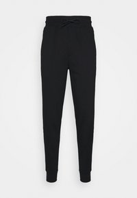 Zwarte joggers van een katoenmix, met een trekkoord in de taille, taps toelopende benen en ribbels bij de manchetten. Soepele textuur zonder patronen of accenten.