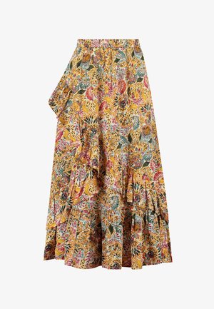 Krilo s cvetličnim vzorcem v rumeni barvi, ki vključuje volančke in večplastno zasnovo. Narejeno iz lahko tkanine z zapletenimi vzorci v zeleni in roza barvi.