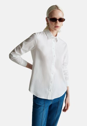 Blusa - white