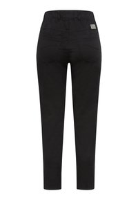 Black cotton pants with a slim fit, featuring five pockets, a mid-rise waist, and subtle stitching details on the back.