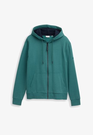 Tirkizna zip-up dukserica s tamnim postavom kapuljače, prednjim kengurim džepovima, vezicama i dugim rukavima na bijeloj pozadini.
