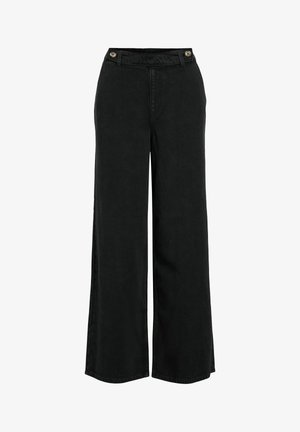 Pantaloni neri a gamba larga realizzati in tessuto testurizzato, dotati di due bottoni rotondi in vita e chiusura con zip.