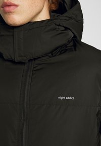 Night Addict Talvitakki - black