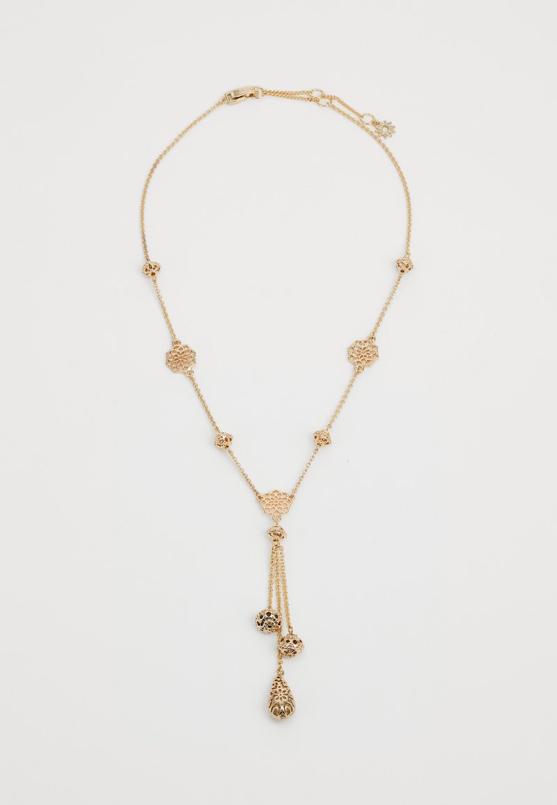 Gold-tone necklace with intricate floral links and dangling accents; features a mix of textured and smooth metal elements.