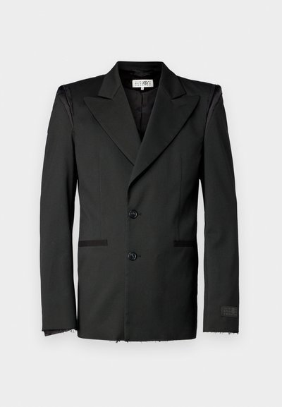 Black blazer with a tailored design, double-breasted buttons, notched lapels, and raw-edge cuffs. Features side pockets and contrasting textures.