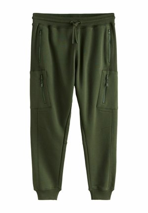 Olivgrüne Jogginghose mit geripptem elastischem Bund und Bündchen, vorne mit Kordelzug und vier Reißverschlusstaschen, zwei an den Oberschenkeln und zwei in Hüfthöhe.