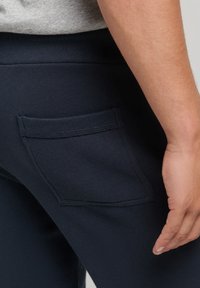 Superdry & Co Spodnie treningowe