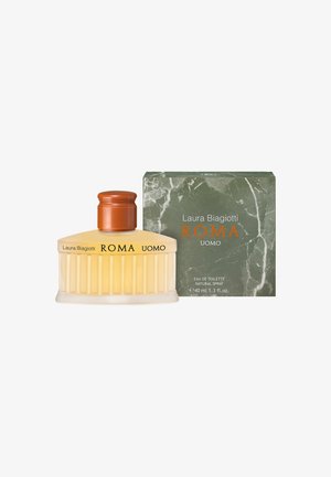 Eau de toilette dans un flacon en verre strié jaune ambre avec un capuchon marron. Accompagné d'une boîte à motif marbre vert. 40ml.