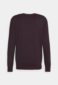 Langärmliger Pullover in dunklem Burgunderrot, mit Rundhalsausschnitt und gerippten Bündchen an den Ärmelenden und am unteren Saum, aus weichem Stoff gefertigt.