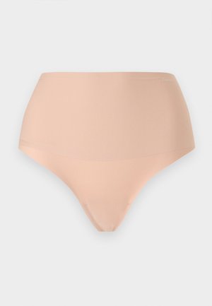 Lenjerie intimă de damă cu talie înaltă, fără cusături, culoare nude, cu finisaj neted și logo subtil Calvin Klein pe talie.