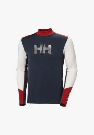 Marineblaues Langarmoberteil mit roten Akzenten und weißen Ärmeln. Verfügt über einen hohen Kragen und ein gestreiftes "HH"-Logo auf der Vorderseite. Strukturierter Stoff.