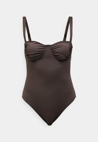 Costume da bagno intero marrone con un corsetto strutturato, coppe arricciate e spalline sottili e regolabili. Tessuto liscio con siluetta aderente.