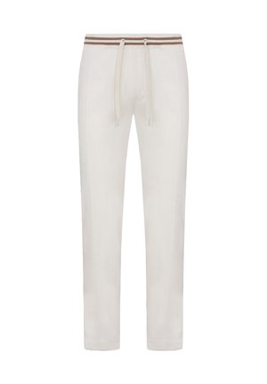 Pantalones de chándal blancos con cintura de cordón, con una banda a rayas marrón. Tejido suave con costuras laterales y piernas ajustadas.