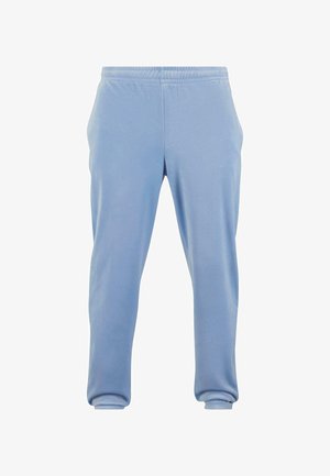 Gaiši zili jogger bikses, izgatavotas no mīksta auduma, ar elastīgu jostu un piedurknēm, ar gludu tekstūru un brīvu piegriezumu.