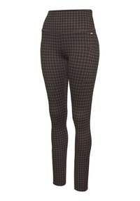 Houndstooth patterned leggings in dark brown, high-waisted design, featuring a sleek texture and side pocket detail. Stretch fabric.