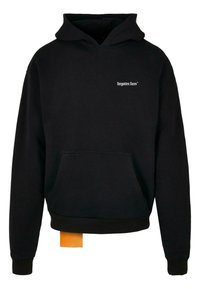 Black hooded sweatshirt made of soft fabric, featuring a front pocket and a small white logo. Cuffs and hem are ribbed; tag visible.