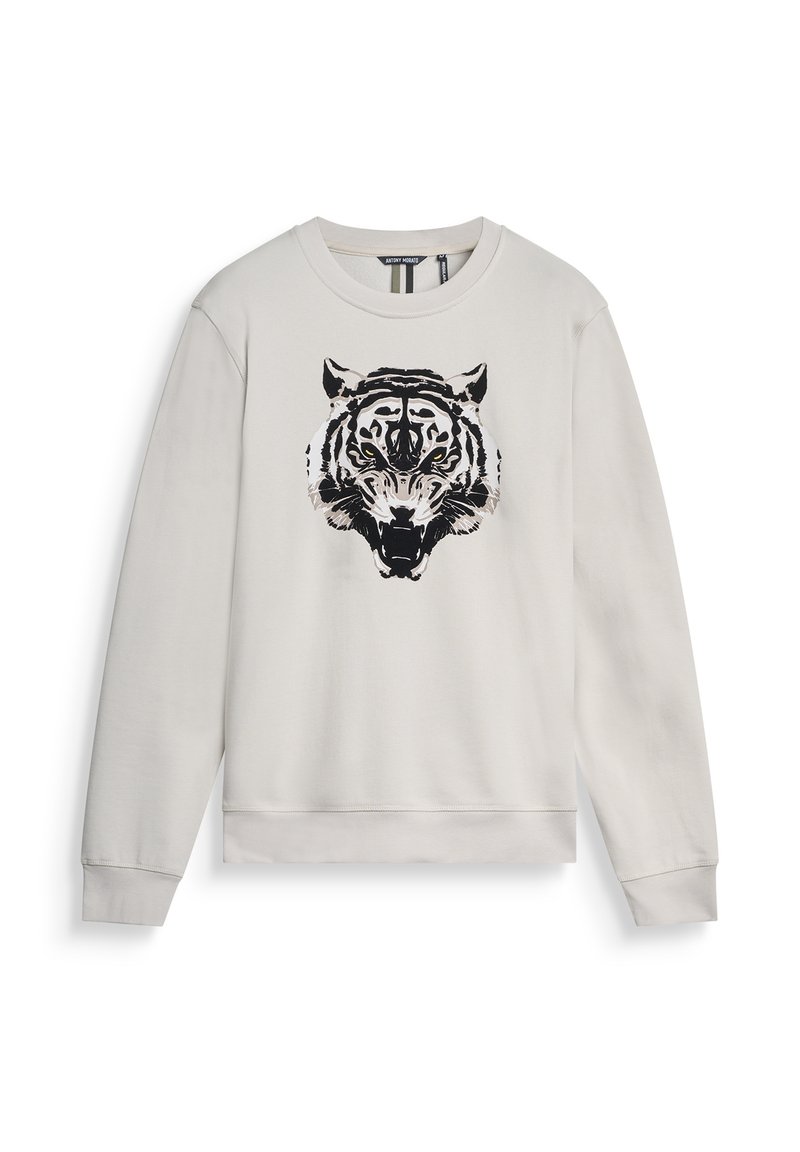 Sudadera gris claro con un gráfico de un tigre en blanco y negro en la parte frontal. Cuenta con puños y dobladillo acanalados, hecha de una tela suave.