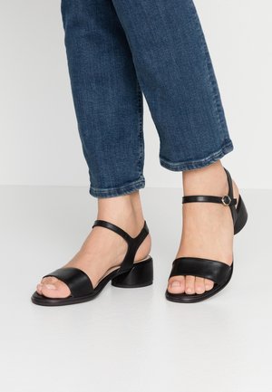 Sandaalit nilkkaremmillä - black