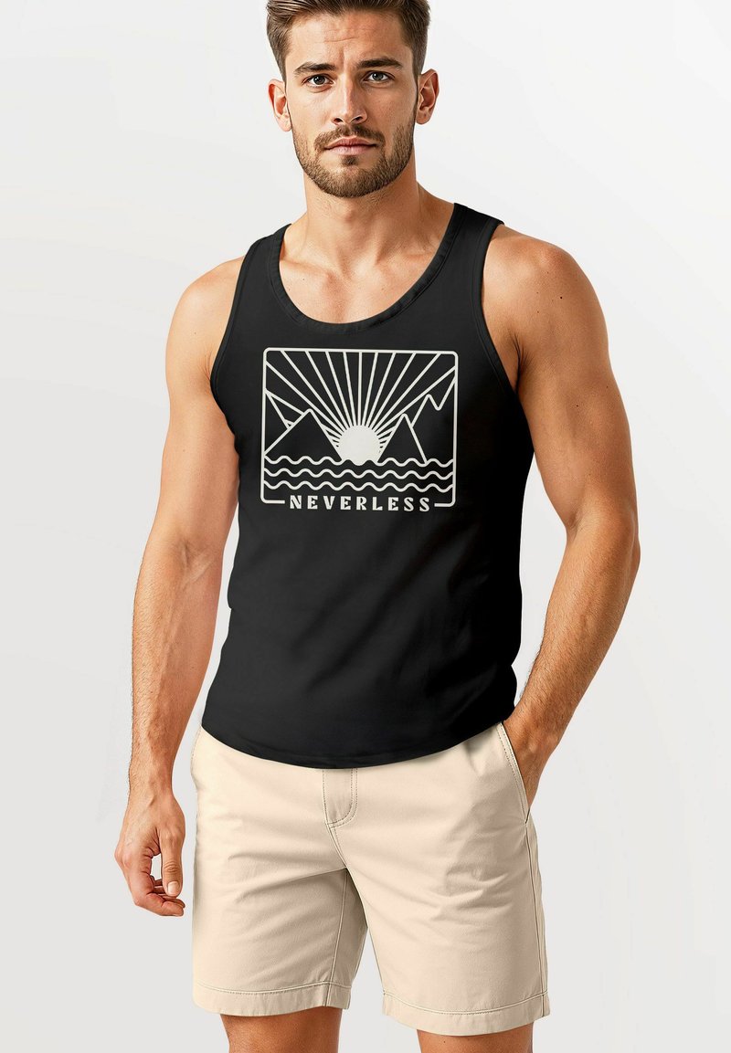 Black tank top featuring a mountain and sun graphic in cream, with the word "NEVERLESS" at the bottom. Model wears beige shorts.