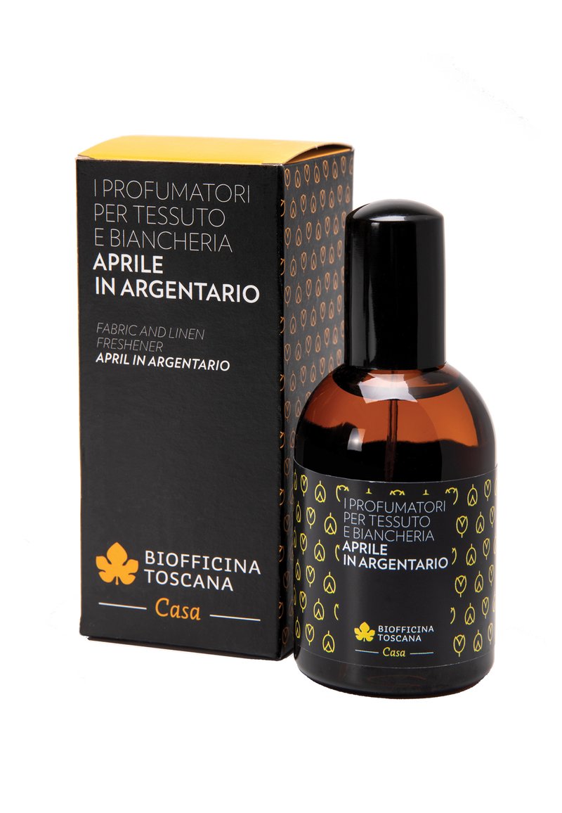 Bottiglia di vetro ambrato scuro con un'etichetta nera che presenta motivi gialli, accompagnata da una scatola nera con testo bianco e arancione.