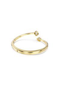 Bracelet doré avec un design de bracelet ouvert, deux cristaux transparents à chaque extrémité, finition lisse et polie, et forme géométrique moderne.