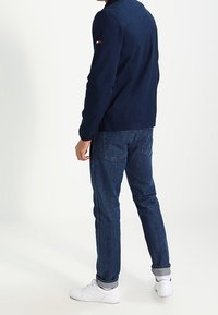 Tommy Jeans Tunn jacka - dark blue