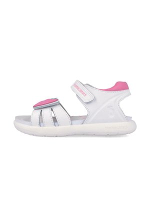 Sandalia infantil blanca y rosa con correas ajustables de Velcro y suela acolchada, diseñada para comodidad y soporte.