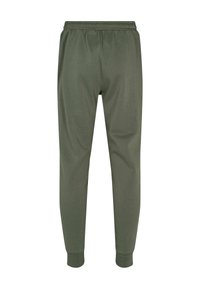 Olivengrønne joggebukser med elastisk midje, avsmalnende ben og ribbestrikkede mansjetter. Laget av mykt, teksturert stoff uten lommer.