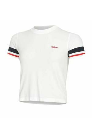 T-shirt blanc court avec des manches courtes. Présente des accents rouges, navy et blancs sur les manches. Logo "Wilson" rouge sur le devant.