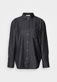 Σκοτεινό γκρι μακρυμάνικο πουκάμισο από ελαφρύ ύφασμα, με κουμπιά μπροστά, γιακά και μία θήκη στο στήθος.