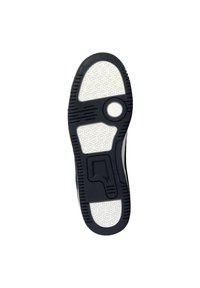 Semelle de sneaker en caoutchouc noir avec un motif en texture hexagonale blanche, comportant un design circulaire et des rainures pour l'adhérence.