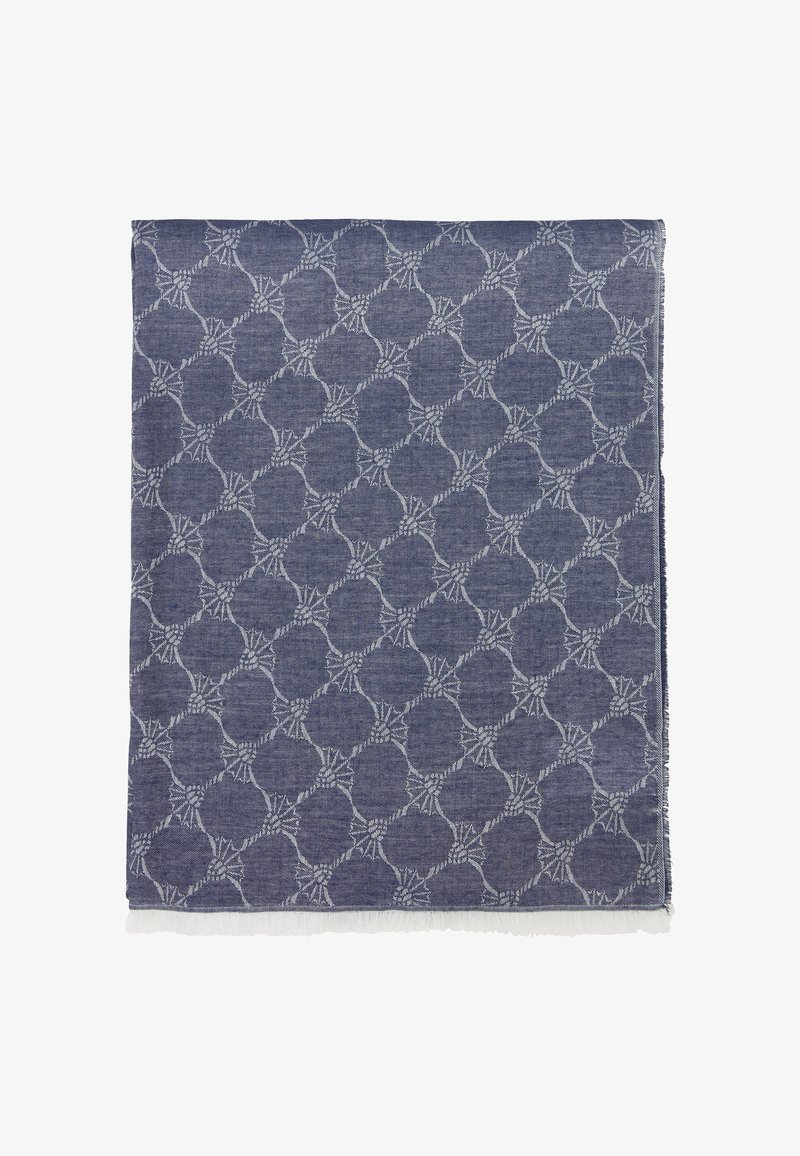 Carré textile bleu avec un motif de nœuds en corde blanche formant une grille en losange et des bords frangés sur un fond blanc.