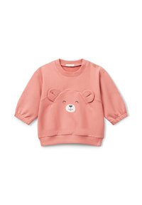 Felpa per bambini di un morbido rosa con un faccino di orsetto sorridente e orecchie in 3D sulla parte anteriore, polsini elasticizzati e un bottone vicino al colletto.