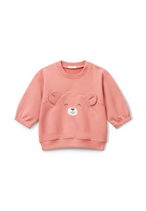 Sweatshirt pour enfants de couleur rose pâle avec un visage d'ours souriant et des oreilles en 3D sur le devant, des poignets élastiques et un bouton près de l'encolure.