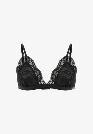 Reggiseno in pizzo nero con coppe morbide, modelli floreali intricati, bordi smerlati, spalline regolabili e una fascia sottostante liscia.