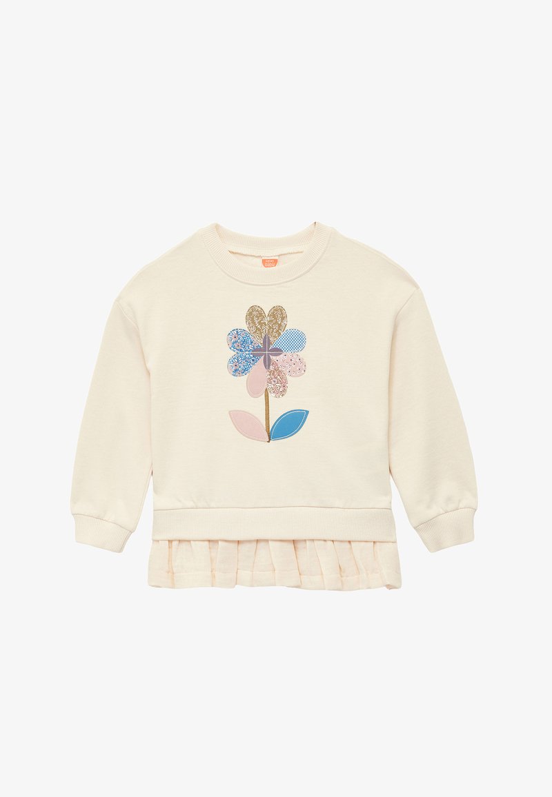 Sudadera crema con un aplique floral en azul, rosa y dorado, con un dobladillo con volantes fruncido. Tela suave y mangas largas.