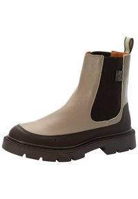 Chelsea boot caratterizzato da pelle liscia beige e pannelli elastici laterali marrone scuro. Suola in gomma marrone spessa con motivo antiscivolo e linguetta per il piede.